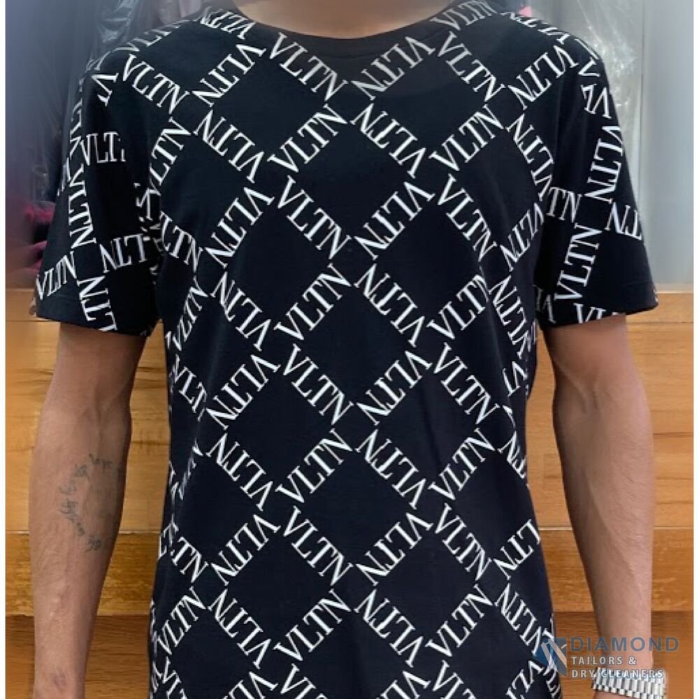 The same t-shirt after alteration — taken in to a slim, tapered fit